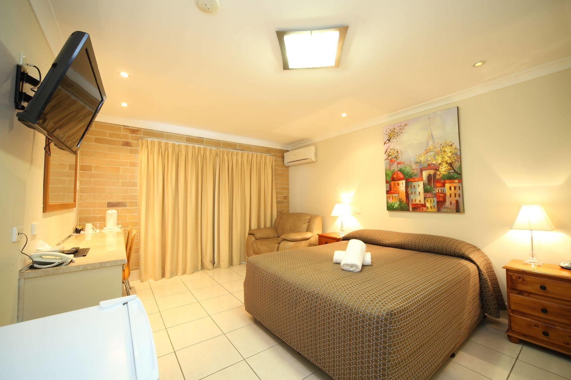 Emerald Central Palms Motel Экстерьер фото